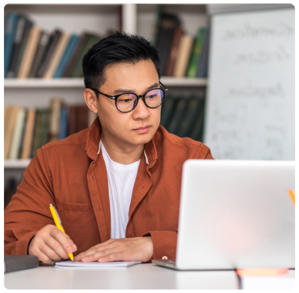 Teacher on webinar on laptop